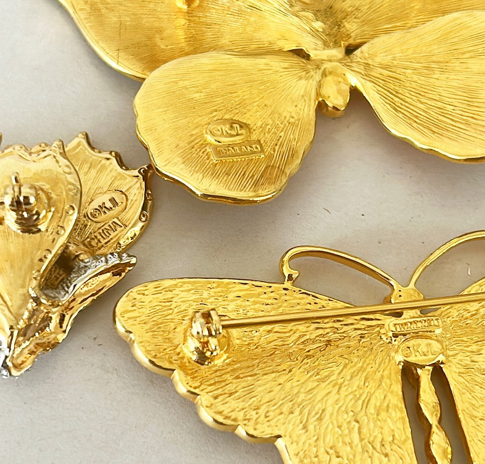 Vintage set of three signed Kenneth Jay Lane butterfly brooches.