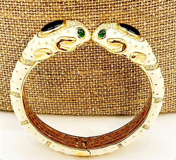 Fabulous double frog head hinged bracelet with clamper style closure.