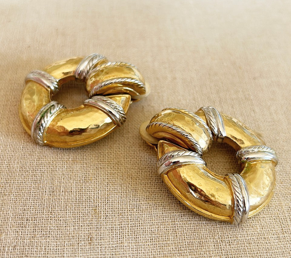 Amazing 1980s stamped GIVENCHY clip on style statement size door knocker style earrings.