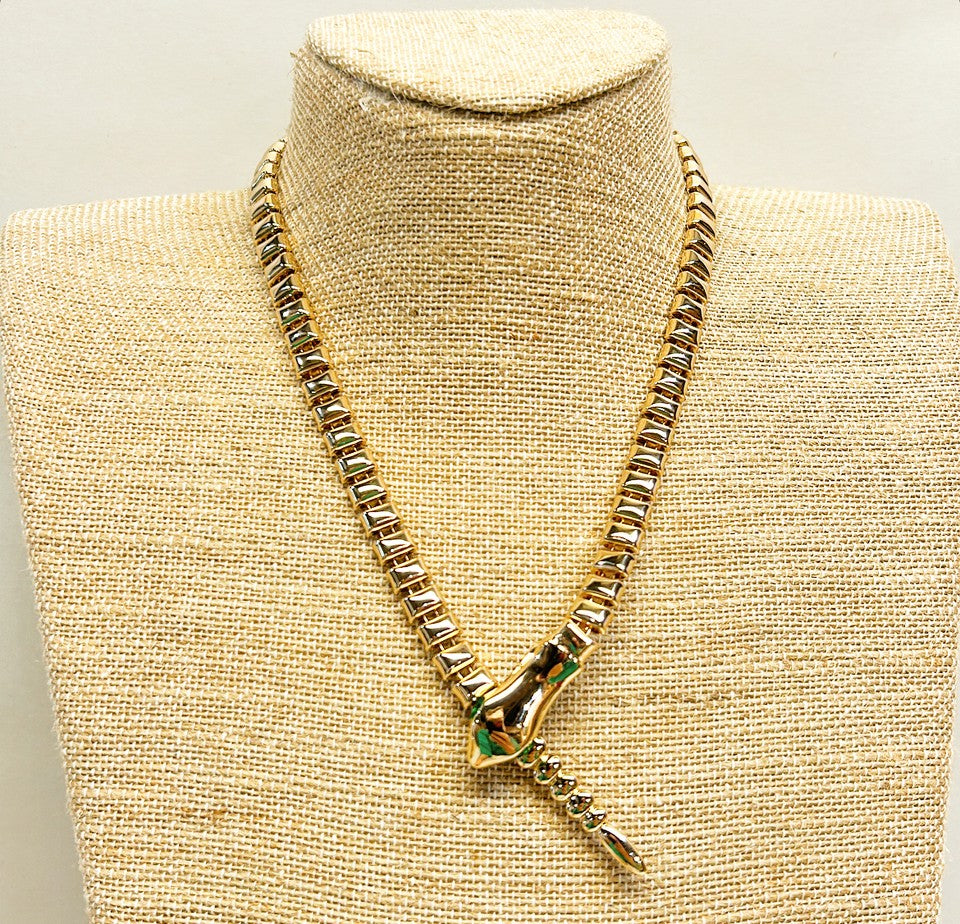 Modern style gold link snake design necklace.