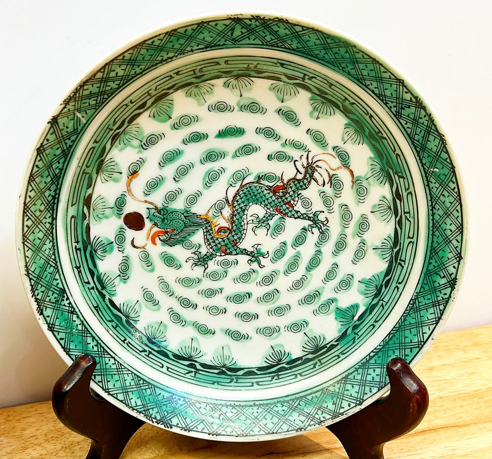 Pair of vintage green &amp; white chinoiserie dancing dragon plates / shallow bowls