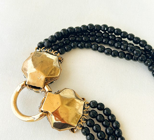 Striking statement double leopard necklace.