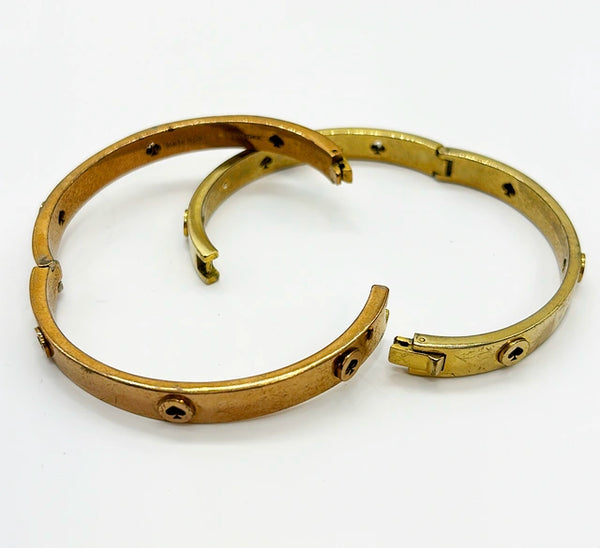 Vintage set of 2 Kate Spade hinged gold tone metal bracelets