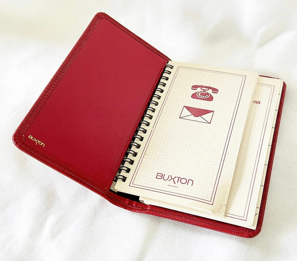 Vintage 1990 stamped BUXTON red wallet style calendar / address book