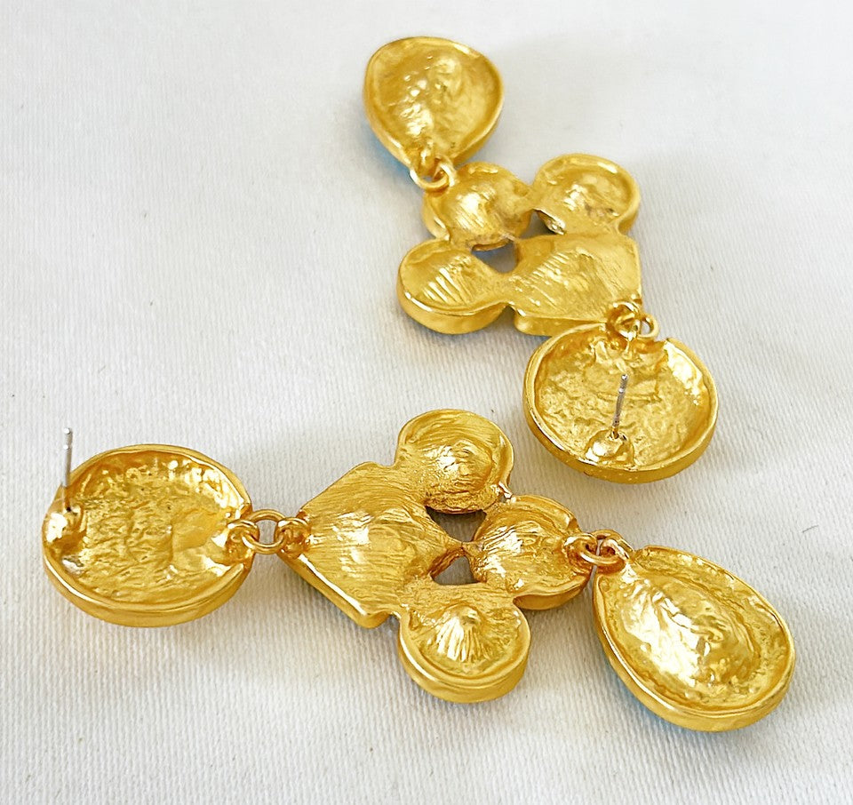 Stunning high fashion runway style statement pierced earrings.