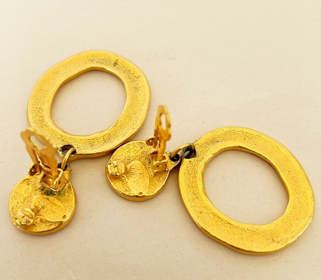 1980s larger sized signed Maxine Denker designer clip on earrings.