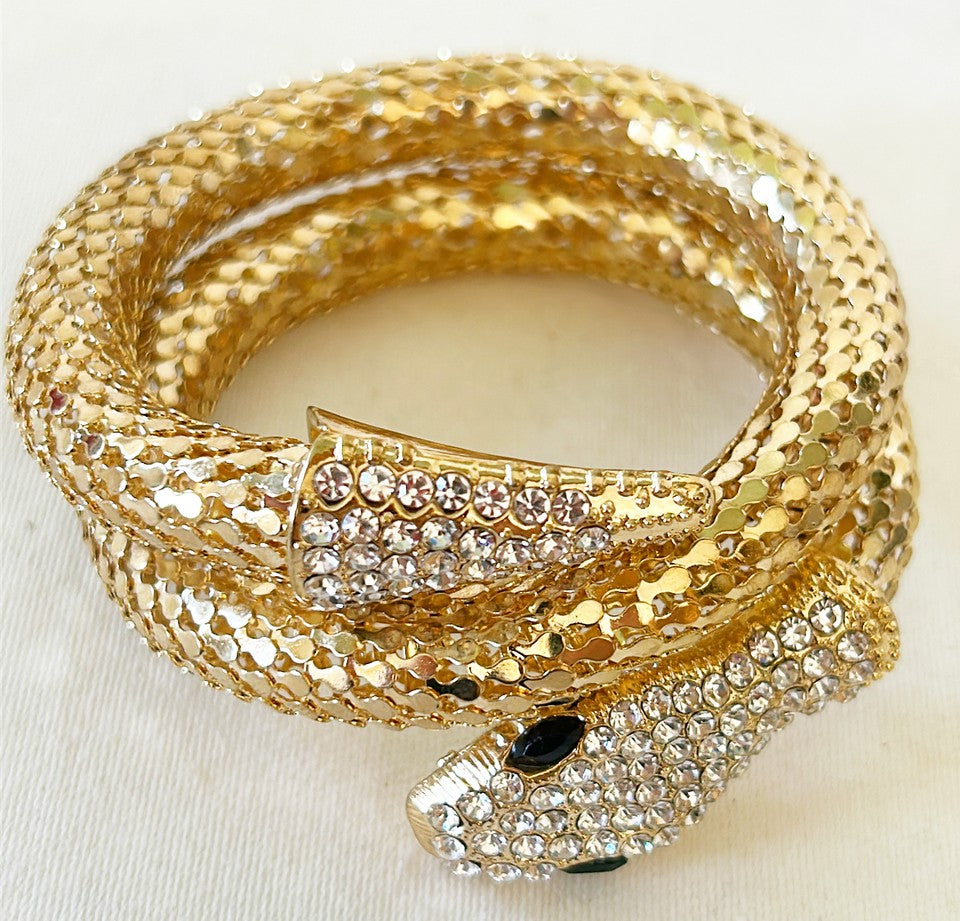 Vintage gold tone metal snake bracelet- flexible style design.