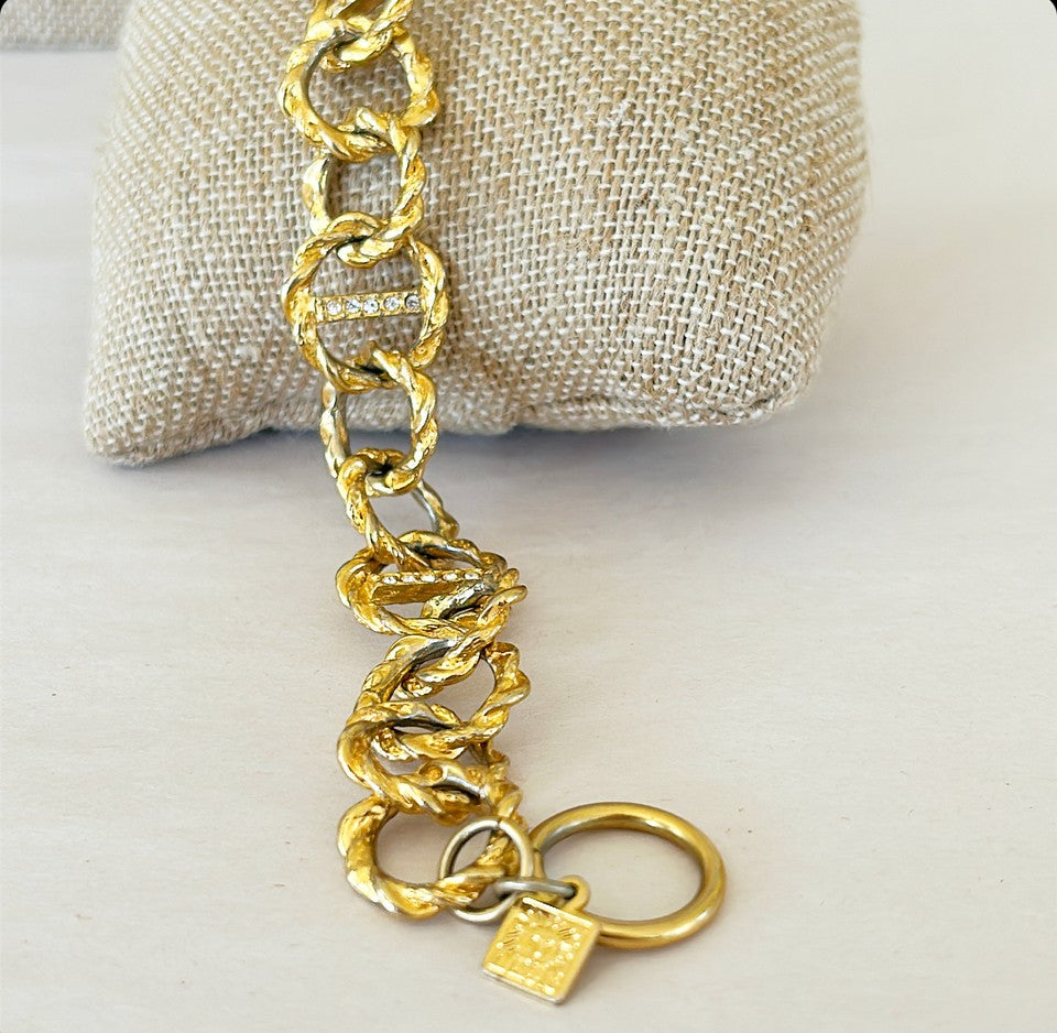 80a signed Anne Klein gold link bracelet.