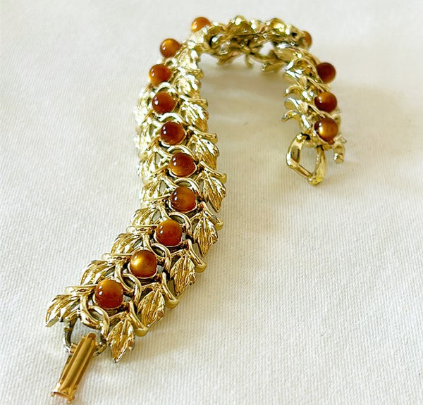 1960s signed Judy Lee leaf cocktail link style bracelet with leaf details mixed with tigers eyes stones.