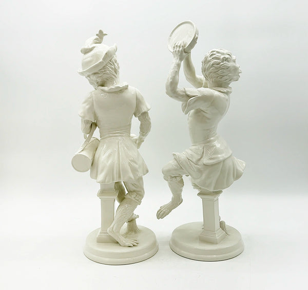 Vintage pair of large Italian cream ware style musical dancing monkeys.