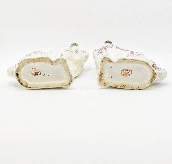 Antique stamped pair of left and right Staffordshire dogs.