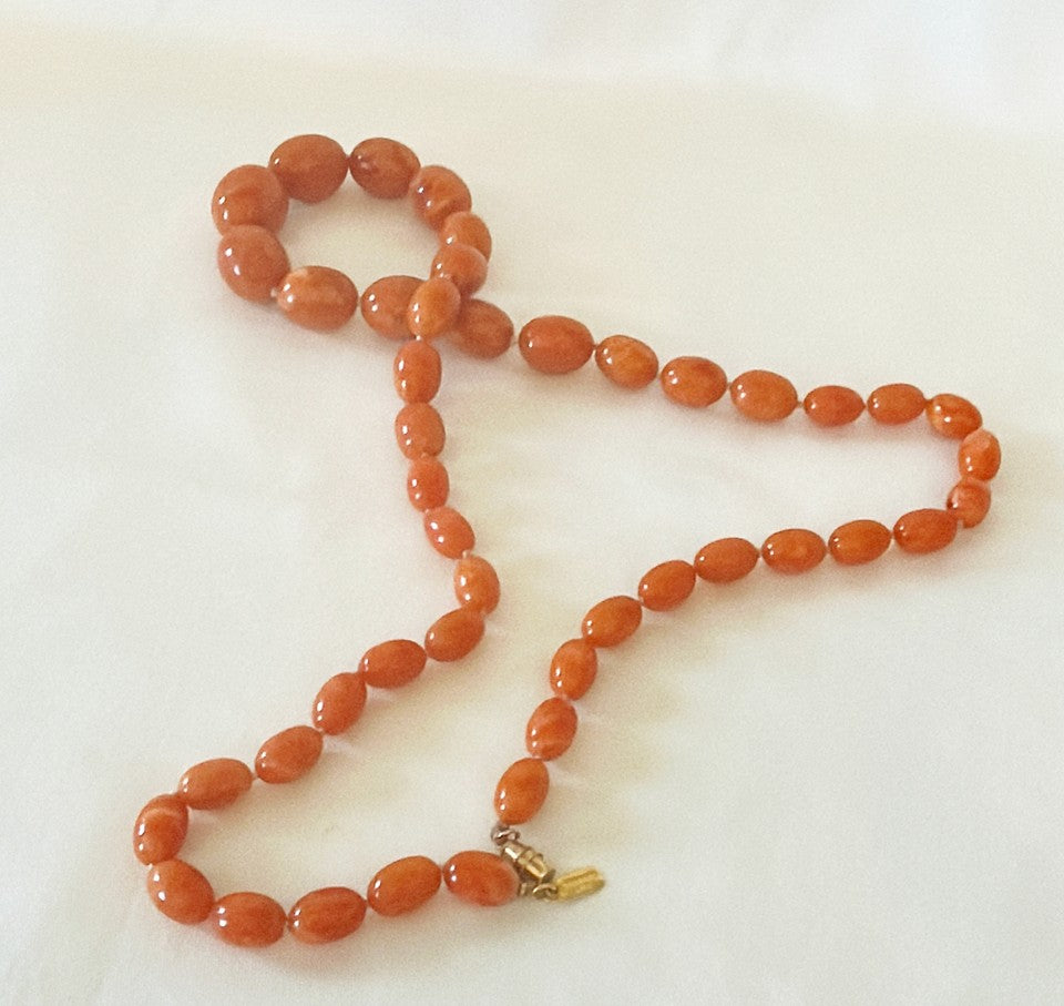 Vintage signed Kenneth Lane amber style beaded statement necklace.