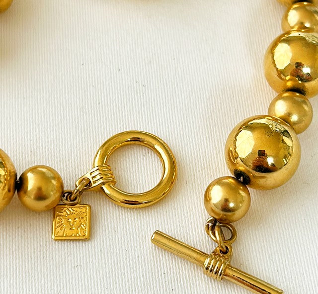 80s signed Ann Klein shiny gold metal beaded necklace.