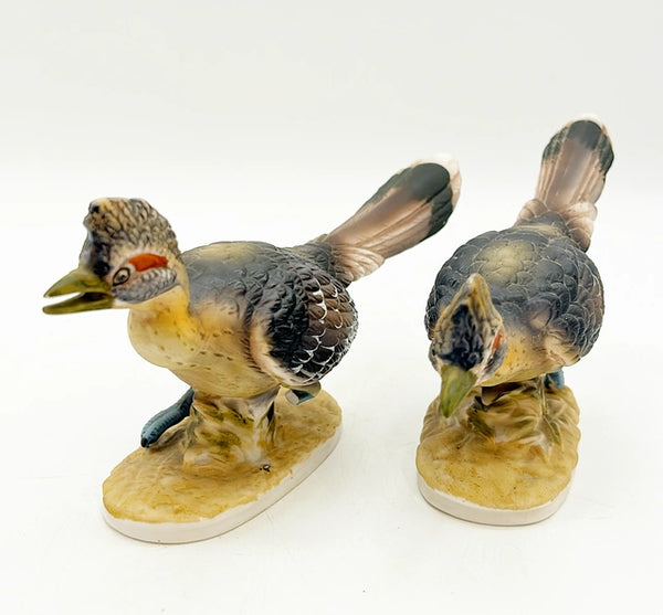 Pair of vintage stamped Royal CrownRoad Runner birds