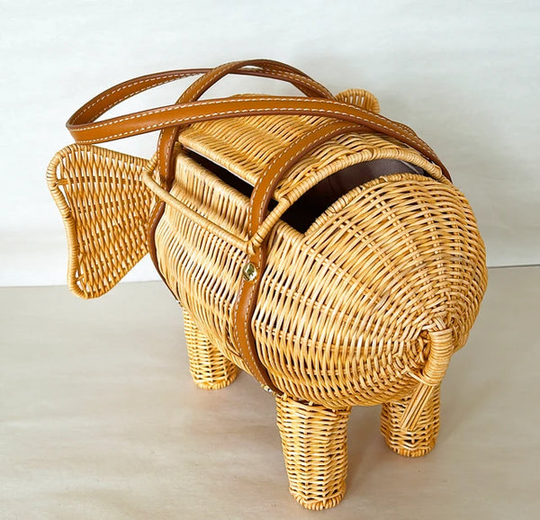 Adorable natural woven wicker elephant purse.