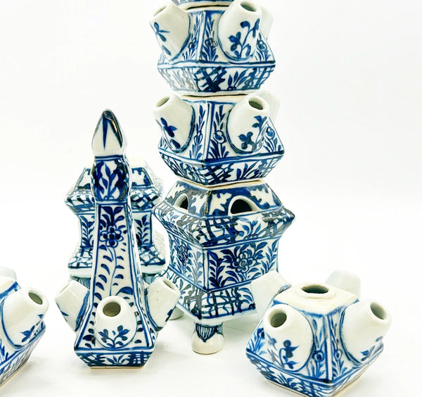 Two matching blue &amp; white chinoiserie style tulipieres.