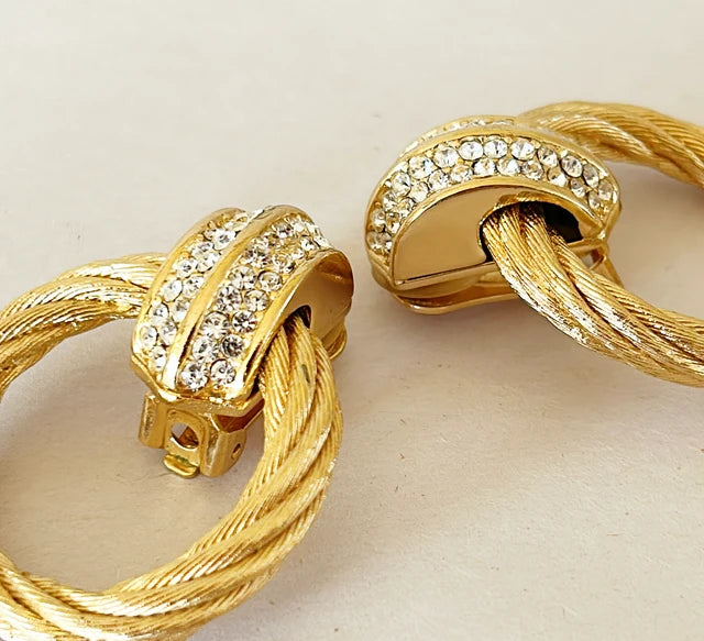 Classic vintage 1980s extra large statement Christian Dior signed clip on earrings.