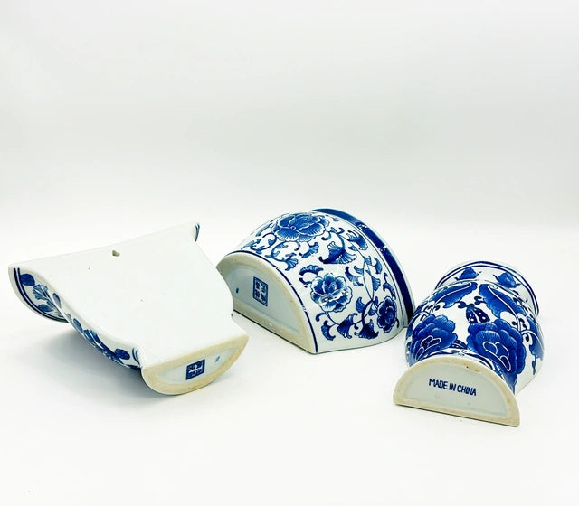 Vintage 90s blue &amp; white chinoiserie style glazed porcelain wall mounted style half vases.