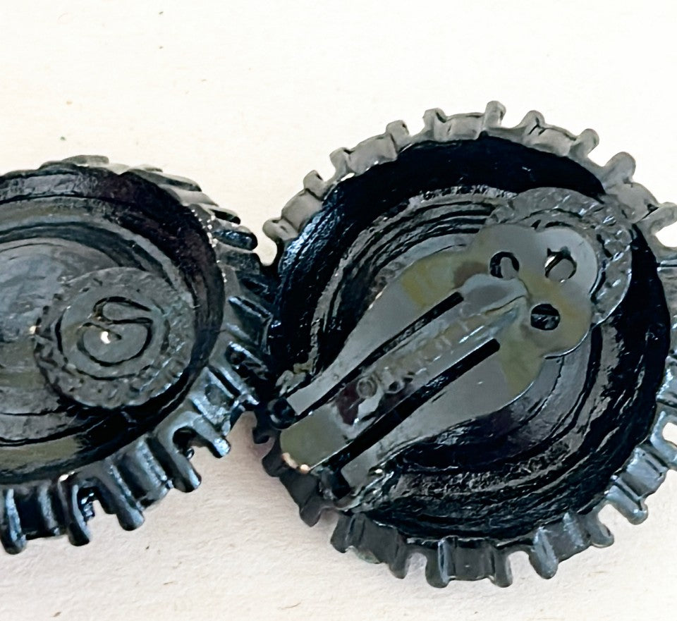 Signed St. John Rare jet back crystal clip on earrings.