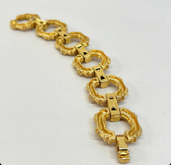 Vintage faux bamboo gold metal link designer bracelet.