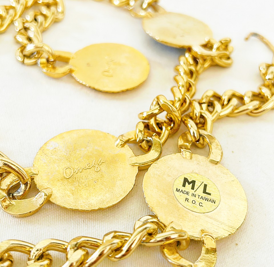 Fantastic late 1980s couture runway style gold chain link metal belt with large coin accents of Roman style medallions.