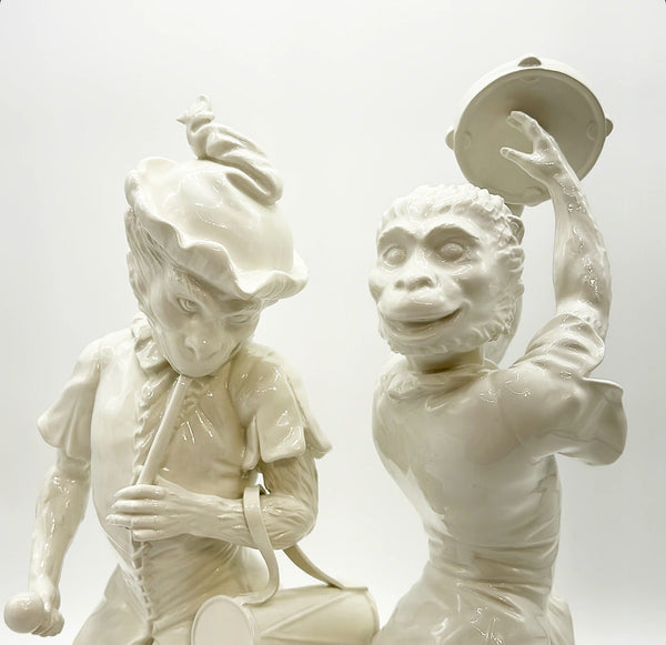 Vintage pair of large Italian cream ware style musical dancing monkeys.