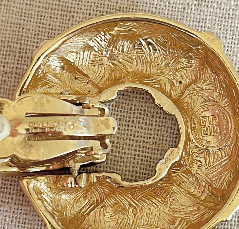 Amazing 1980s stamped GIVENCHY clip on style statement size door knocker style earrings.