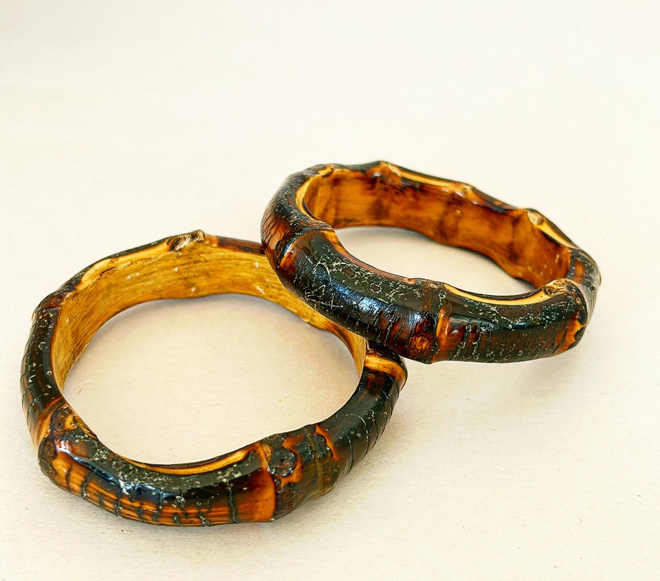 Pair of 1970s real carved burnt bamboo style bangle bracelets.