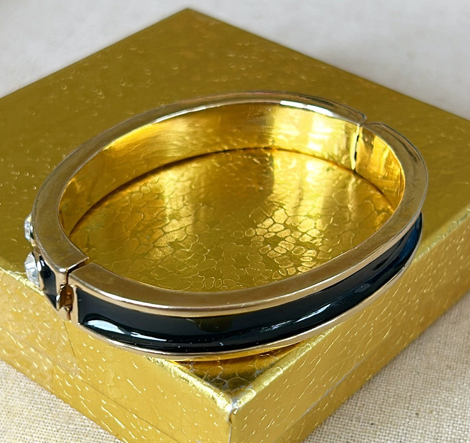 Rare early 90s stamped GIVENCHY bangle bracelet with working clasp that opens.