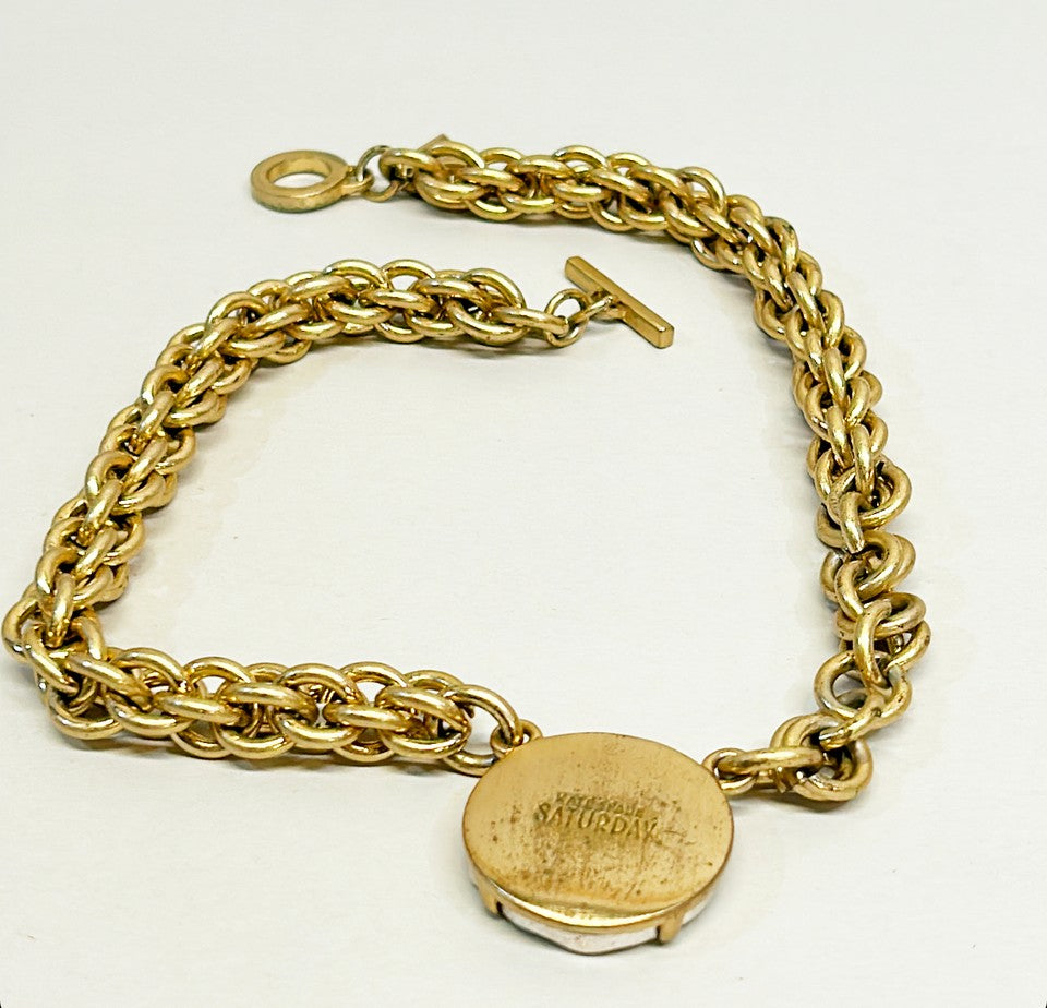 Rare signed Kate Spade “Saturday” coin necklace.