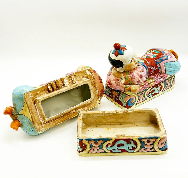 Pair of vintage left and right Asian style figure boxes.