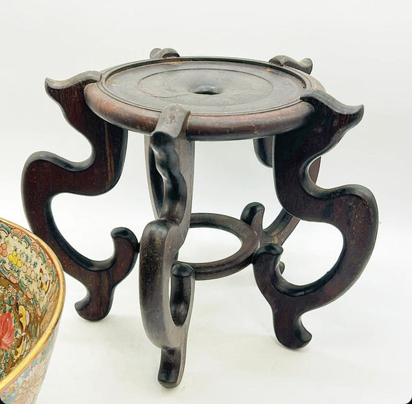 Massive vintage famille rose style centerpiece bowl with wooden stand.