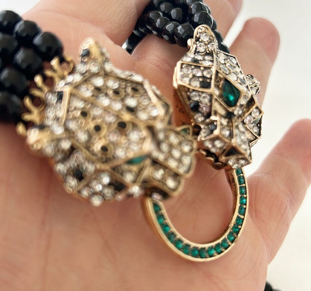 Striking statement double leopard necklace.