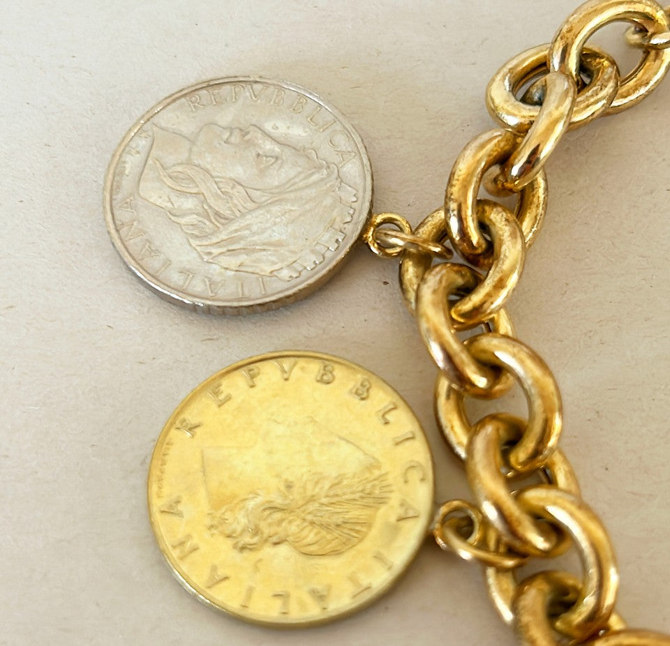 Amazing vintage Italian 18k gold over silver stamped Italian coin charm bracelet.