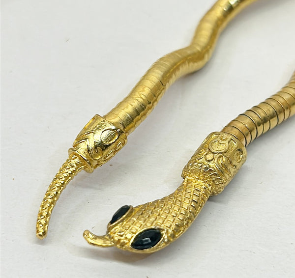 80’s sculptural style gold metal omega look that can be twisted and shaped into a necklace
