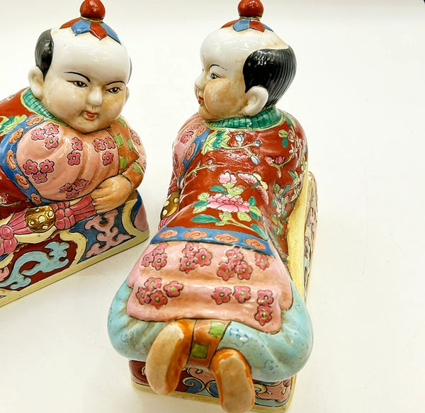 Pair of vintage left and right Asian style figure boxes.