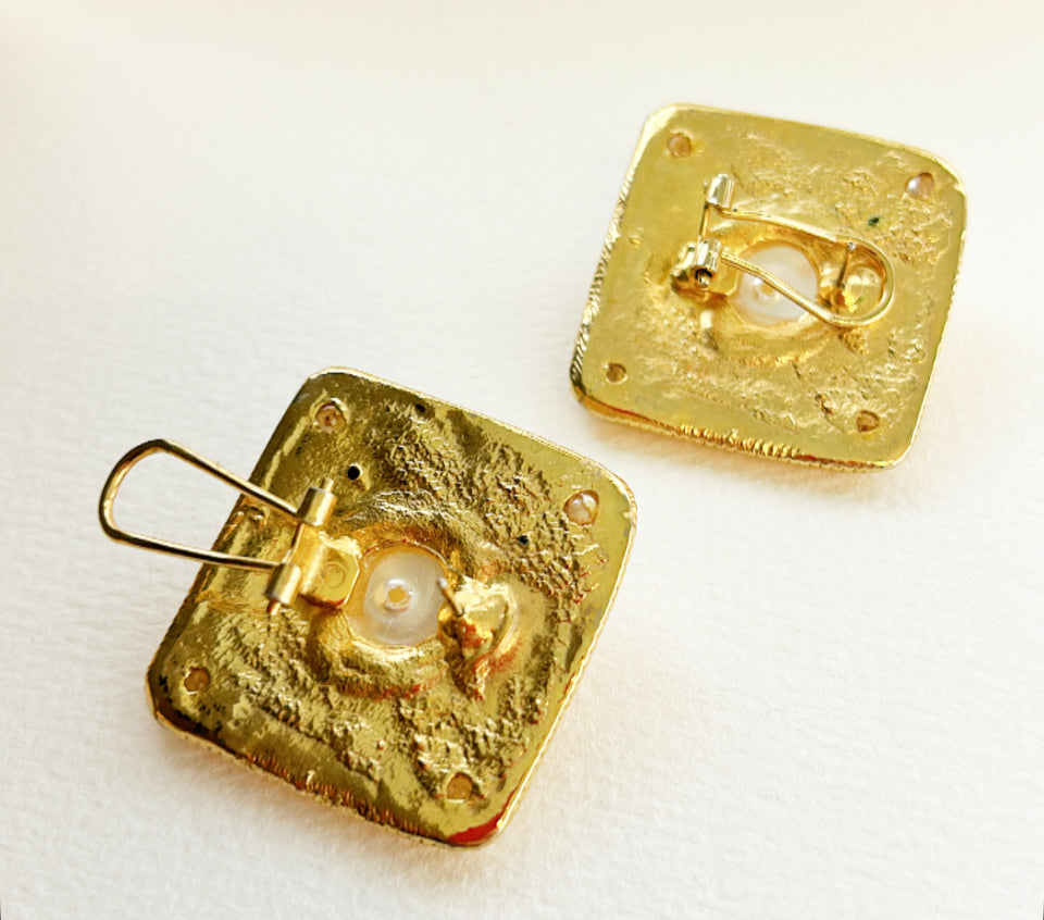 Designer style vintage pierced statement earrings.