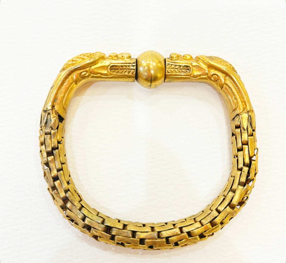Vintage gold metal chinoiserie double headed dragon bracelet.