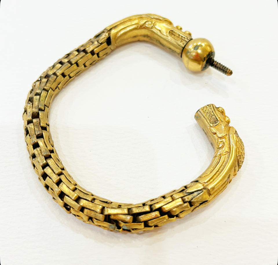 Vintage gold metal chinoiserie double headed dragon bracelet.