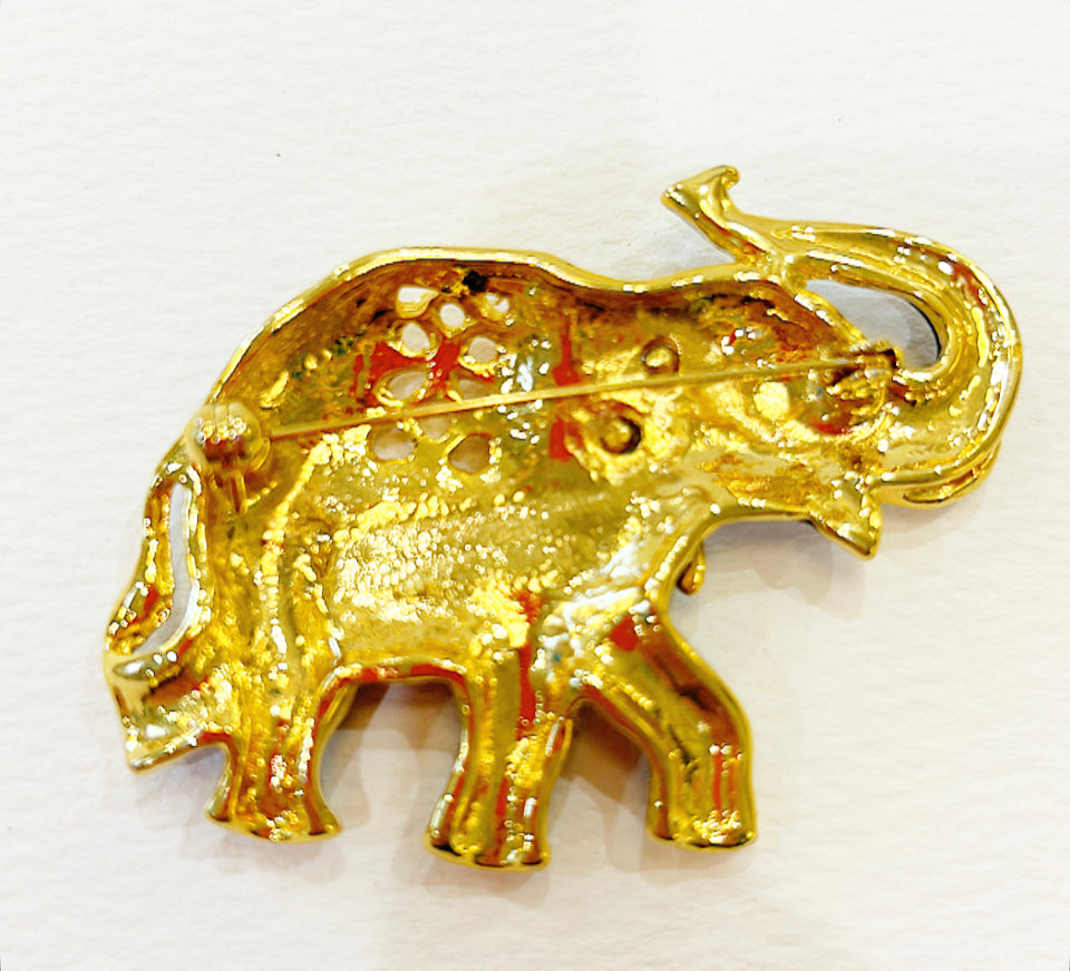 Vintage blue enamel & gold metal elephant brooch.