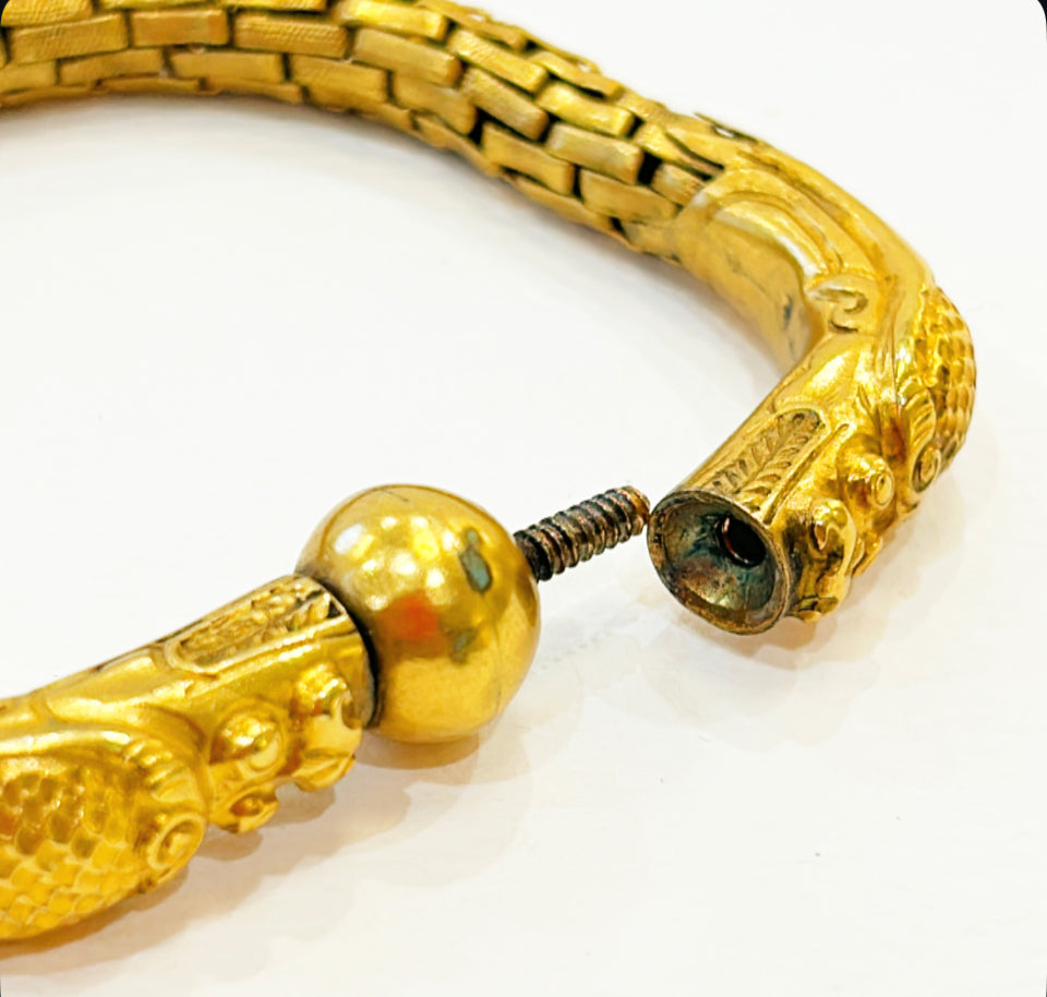 Vintage gold metal chinoiserie double headed dragon bracelet.