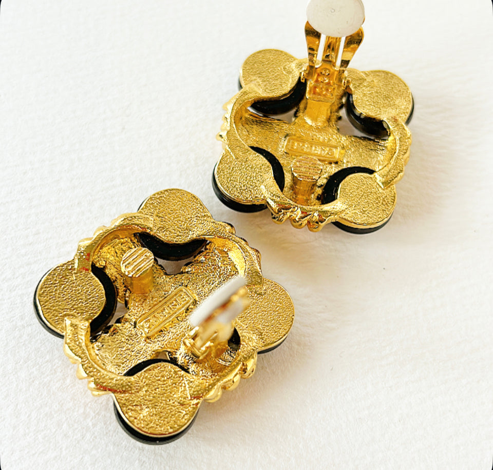 Vintage statement clip-on earrings by Carlisle