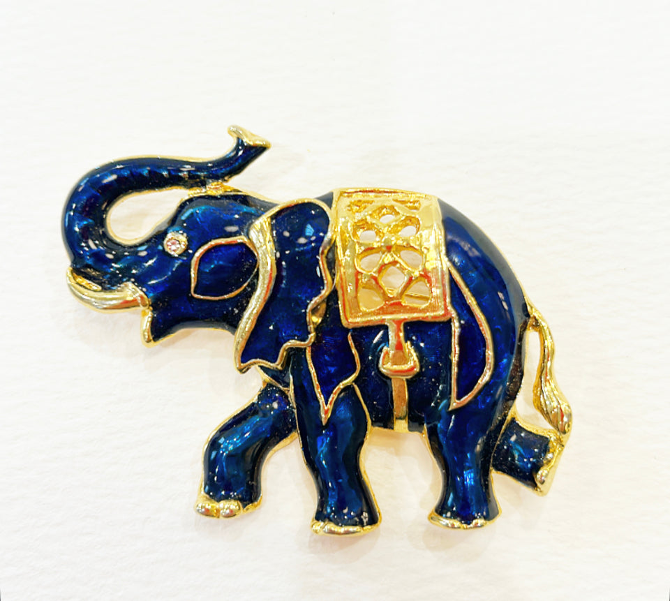 Vintage blue enamel & gold metal elephant brooch.