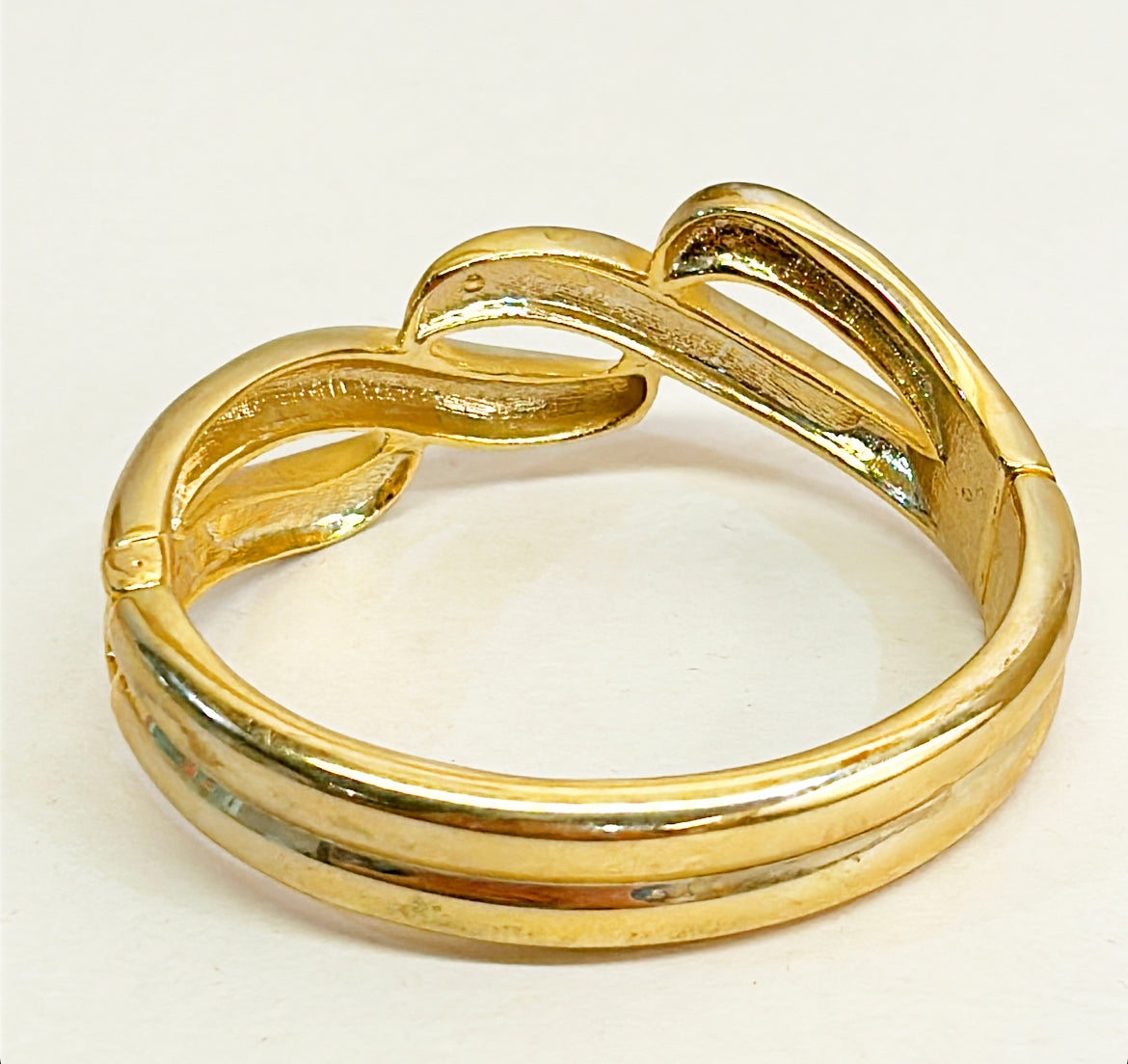 Vintage gold metal &amp; rhinestones hinged designer style bracelet.