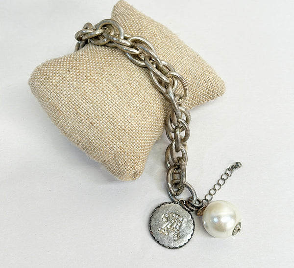 1960s vintage silver chunky monogram charm “A” bracelet with a large faux pearl charm accents.
