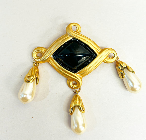 Vintage large scale statement brooch with dangling faux pearl accents.