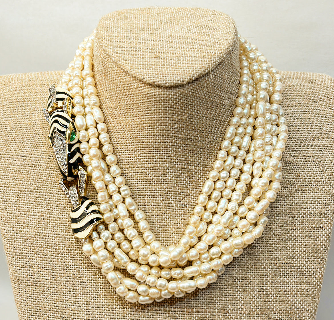 Rare vintage signed CINER faux fresh water style pearl necklace with metal zebra statement clasp.