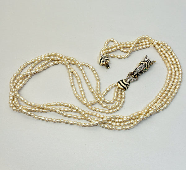 Rare vintage signed CINER faux fresh water style pearl necklace with metal zebra statement clasp.