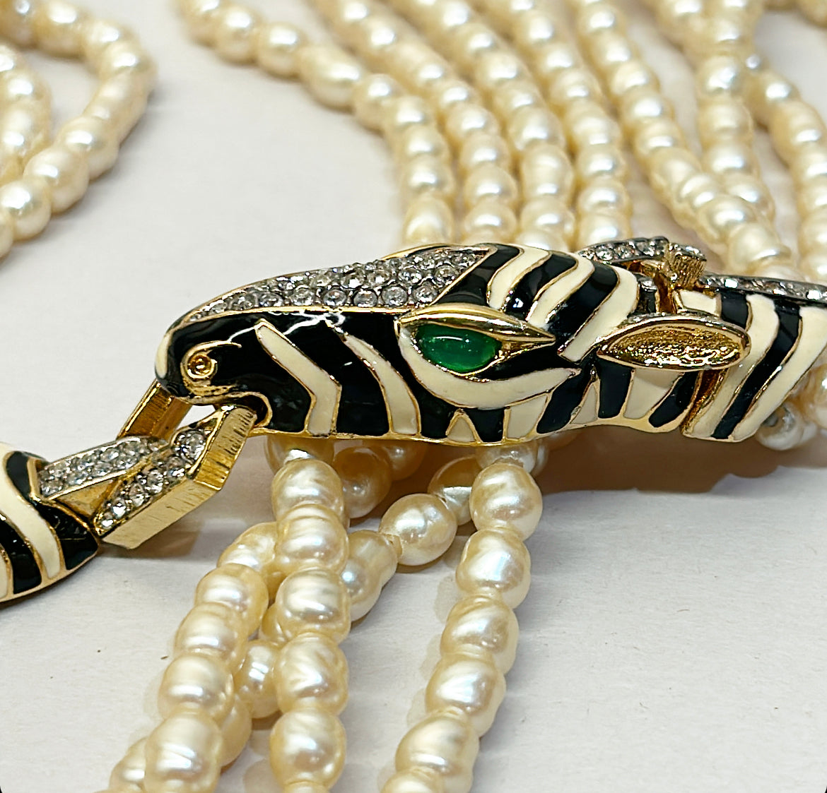 Rare vintage signed CINER faux fresh water style pearl necklace with metal zebra statement clasp.