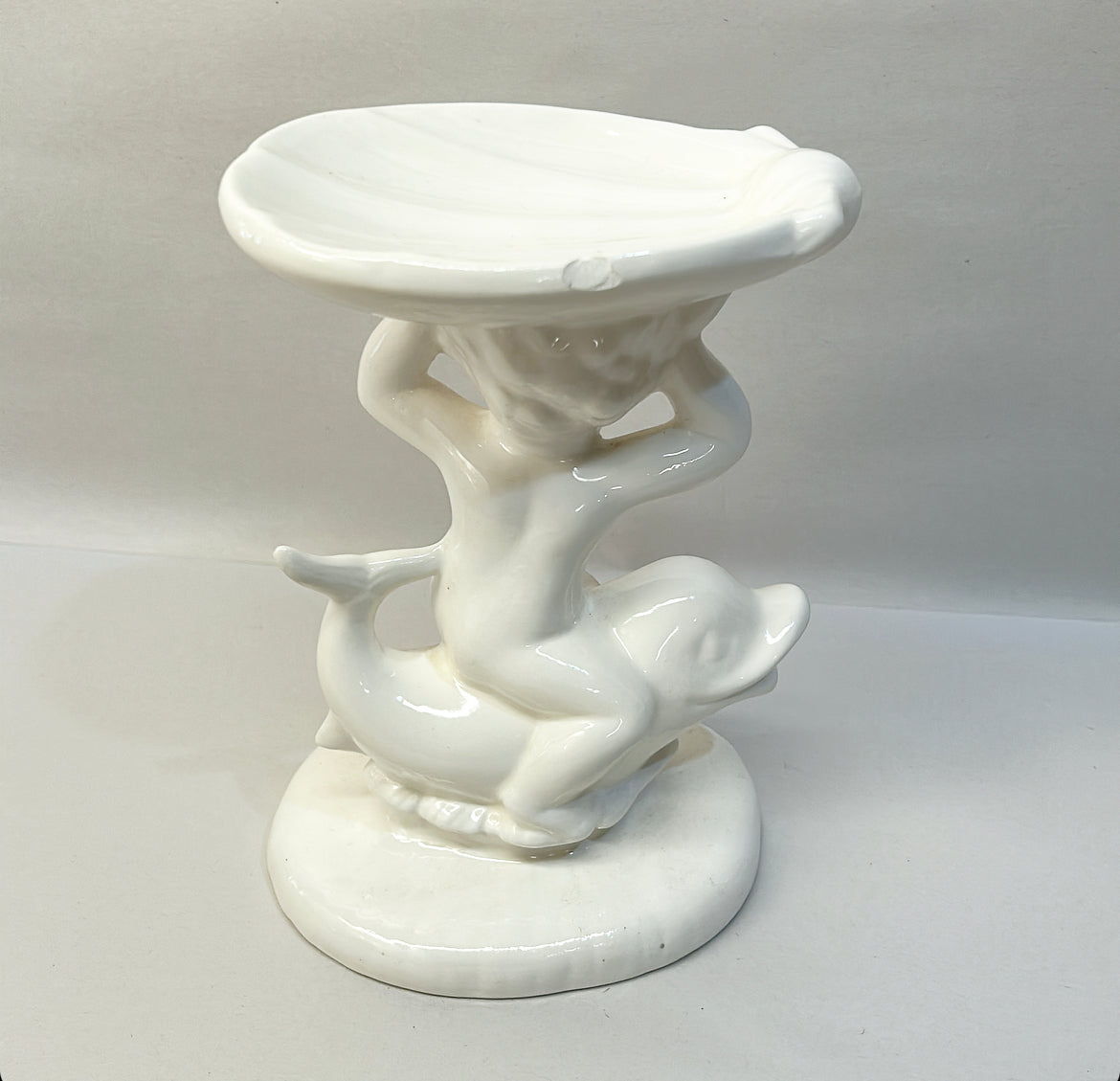 Pair of vintage pair of Westmoreland white milk glass dolphin / koi fish candlestick holders.